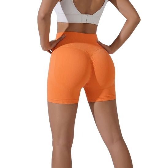 Short fitness femme orange taille haute - vue profil coupe ajustée
