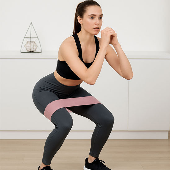 bande elastique femme fait squats