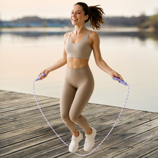 corde a sauter sport violet cardio fitness femme sauts out door