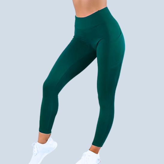 legging sport femme vert taille haute gainant push up fessier extensible avec poches laterales 