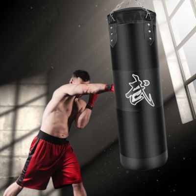 sac-de-boxe-pour-renforcement-musculaire-homme-en-gants-de-boxe-exercice-de-frappe-pour-ameliorer-endurance-et-coordination