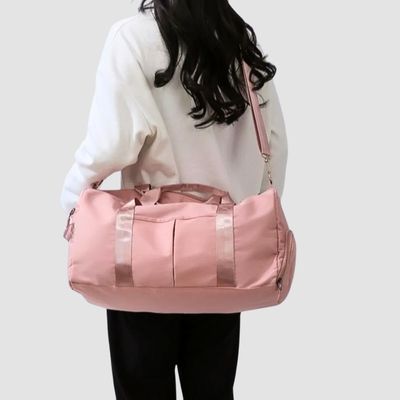 sac sport voyage rose 20-35L en bandoulière femme active