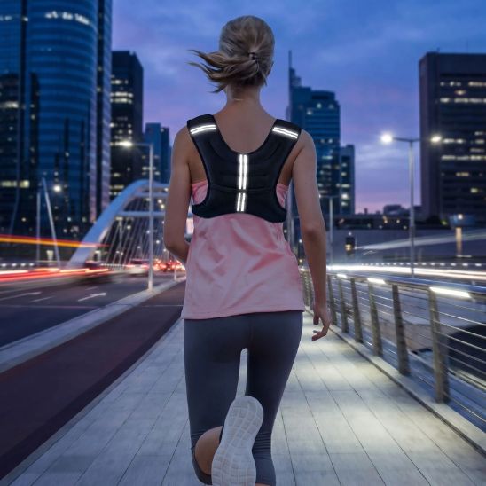 Veste lestée femme jogging urbain nocturne - bandes réfléchissantes
